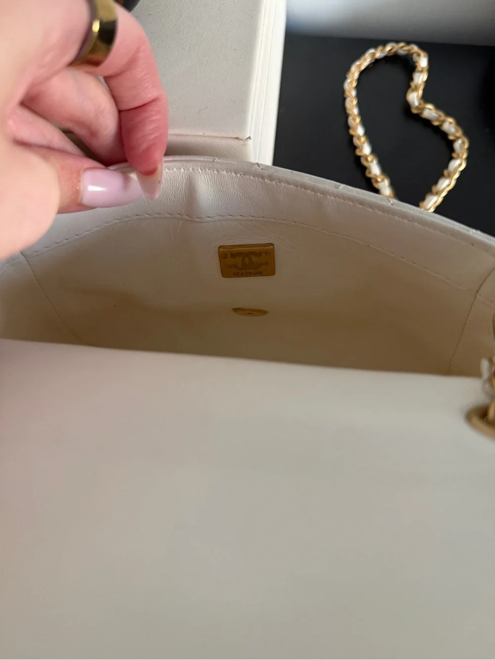CHANEL White Quilted Mini Flap Bag with Gold Chain and CC Turn-Lock
